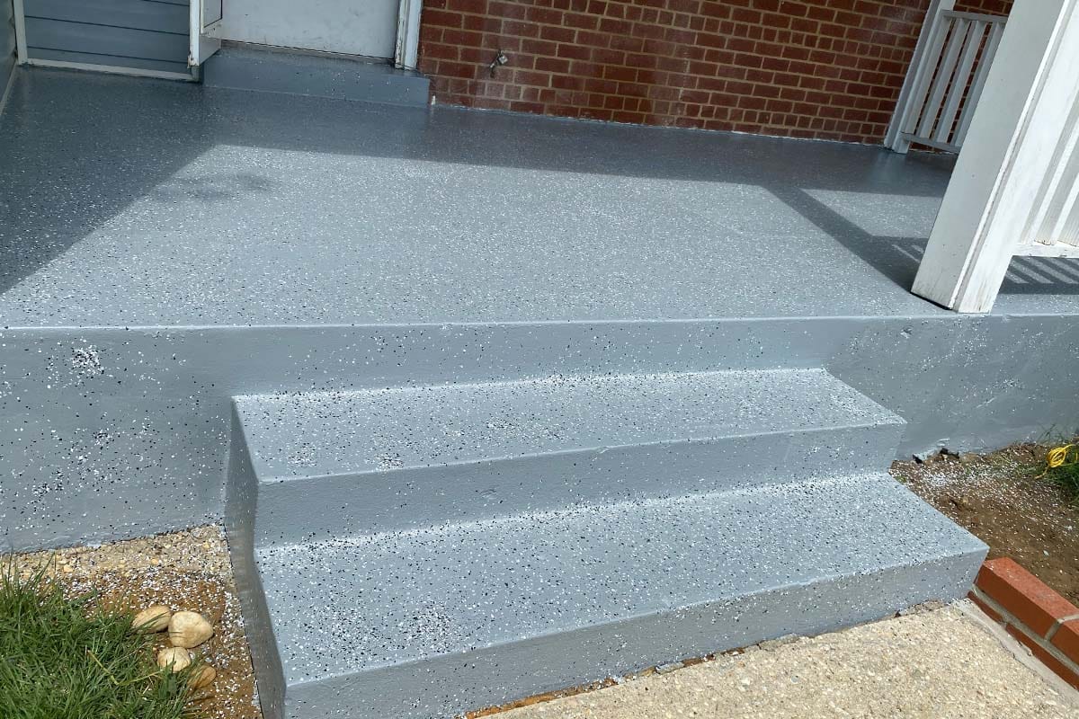 Closeup on concrete steps installed in the entrance of a DC house